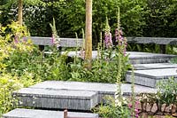 Steps made from hand-cut slate stacked together. The Brewin Dolphin Garden. RHS Chelsea Flower Show, 2015