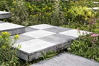 Steps made from hand-cut slate stacked together. The Brewin Dolphin Garden. RHS Chelsea Flower Show, 2015