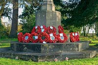 Poppy wreathes around war memorial, Clifton, Bristol, UK.