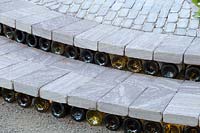 Hampton Court Flower Show 2014, the Bacchus Garden, des. Wardrop Designs. Old wine bottle steps risers