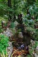 Hanham Court Gardens, Bristol.  Autumn, the pond next to the stumpery