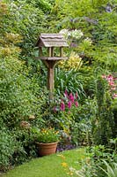 62 Hillcrest Rd, Nailsea, Somerset, UK. ( Andy Luft ) small town garden with good structure, interesting trees and shrubs. Bird table