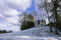 Painshill Surrey Picturesque landscape garden Gothic tower in winter