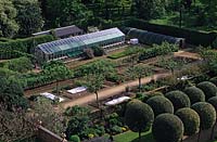Hatfield House. Hertfordshire. Organic walled kitchen vegetable garden over view. glass houses.