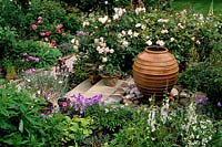 Private garden Sussex Pithoi water feature Shallow steps Rosa Penelope