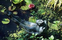 figurative sculpture by Janis Ridley in pond