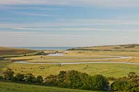 Cuckmere valley East Sussex England meandering river flood plain view sea English Channel summer English landscape South Downs