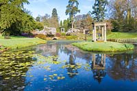 View of lake in The formal Temple Garden at Cholmondeley Castle, Cheshire, UK.