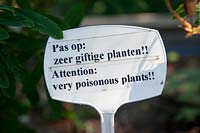Warning sign: Pas op: Zeer giftige planten. Attention: Very poisonous plants.