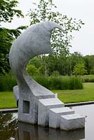 Marble sculpture: Bird by Jessica Walters MRBS on water. 
Wakelins Willow, Suffolk