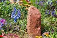 Water feature in a mixed border  - 'Jungle Fever', RHS Tatton Park Flower Show, 2018. 