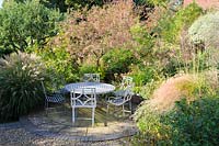 Garden seating area on patio, Shropshire, UK