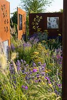 COR-TEN steel screens with perennials and grasses. 'RNIB Community Garden', RHS Hampton Flower Show 2018.