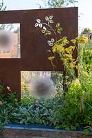 Stone veneered raised bed with COR-TEN steel screen, Achillea and Stachys byzantina. 'RNIB Community Garden', RHS Hampton Flower Show 2018