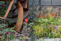 William Roobrouck Steel orb, Actaea, Dahlias and Cosmos with cedar screen. 'Elements Mystique', RHS Hampton Flower Show, 2018