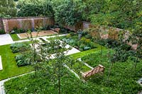 Overview of wild flower turf and fruit trees, London