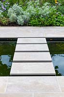 Detail shot of stepping stones. Garden designed by Peter Reader Landscapes.