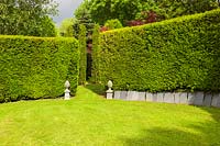 A clipped Yew hedge enclosure. Plaz Metaxu Garden, Devon, UK. 