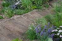 Railway sleeper path in Southend Council 'By The Sea' garden at RHS Hampton Court Flower Show, London, 2017.
