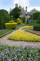 Box-edged borders and unusual topiary shapes at Levens Hall and Garden, Cumbria, UK, 