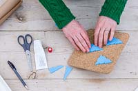 Gluing foam Christmas tree shape onto a cork stamping pad