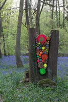 painted cut timber logs in woodland