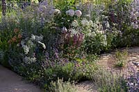 Mixed, flowering border. Best of Both Worlds Garden, Sponsored by BALI, RHS Hampton Court Palace Flower Show, 2018.