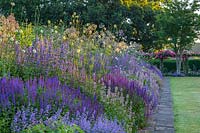 Long herbaceous border at Town Place in Sussex, UK. 