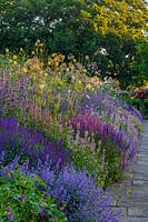 Long herbaceous border at Town Place in Sussex, UK.
