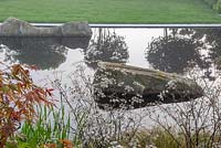 Anthriscus sylvestris 'Ravenswing' next to a reflective pool with split boulders - The Leaf Creative Garden - A Garden of a quiet contemplation - RHS Malvern Spring Festival 2019