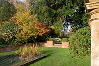 Mixed planting showing seasonal colour at Easton Lodge, Essex, UK. 