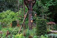 Reclaimed inspection tower with industrial style lamps - The Walker's Forgotten Quarry Garden, RHS Chelsea Flower Show 2019