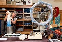 Alison Ellen Hand Knits studio - Alison Ellen in her studio dip dyeing wool using acid dyes.