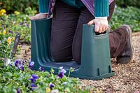 Garden kneeler with sides for help getting up. 