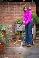 Jet washing paths and paving