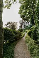 Path running along towards the house. Les Jardins d Etretat, Normandy, France.