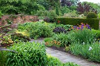 Hot borders in the Llanhydrock Garden at Wollerton Old Hall Garden.