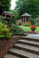 Steps beside bird feeding station, leading to lawn and summerhouse - Open Gardens Day 2014, Laxfield, Suffolk