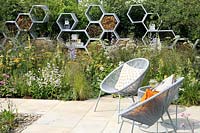 A contemporary urban garden designed to encourage wildlife and insects. The Urban Pollinator Garden, RHS Hampton Court Palace Garden Festival, 2019.  