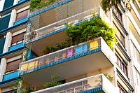 Balconies of apartment block viewed from street level 