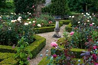 Sundial in centre of Parterre with Rosa - Rose - beds edged with Buxus - Box 