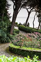 Formal gardens with ocean view, at Villa Agnelli Levanto, Italy.

