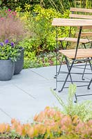 Slate patio with bistro table and chairs