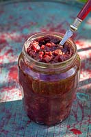 Allotment apple and vegetable pickle in a jar. Ingredients include swede, courgettes, beetroot, cauliflower, carrots and apples