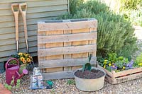 Tools and materials required to make a rainbow pallet planter