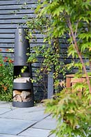 Modern Town Garden - wood burner and Acer.