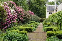 View of the Shade Walk towards the main house, along side the Pleached Lime Walk. 