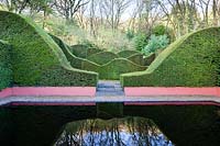 The Reflecting Pool and Hedge Garden. Wave-form cut Hedges of Taxus baccata 'Yew'.  