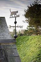 Cat and mouse weathervane at the Old Rectory, Netherbury, UK.