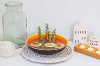 Bowl with homemade room scent made with Salvia rosmarinus - Rosemary - and Lemon 